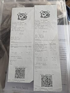 Sniffy, the worldwide traveling beagle, showing Lisbon rabies vaccination receipt cost