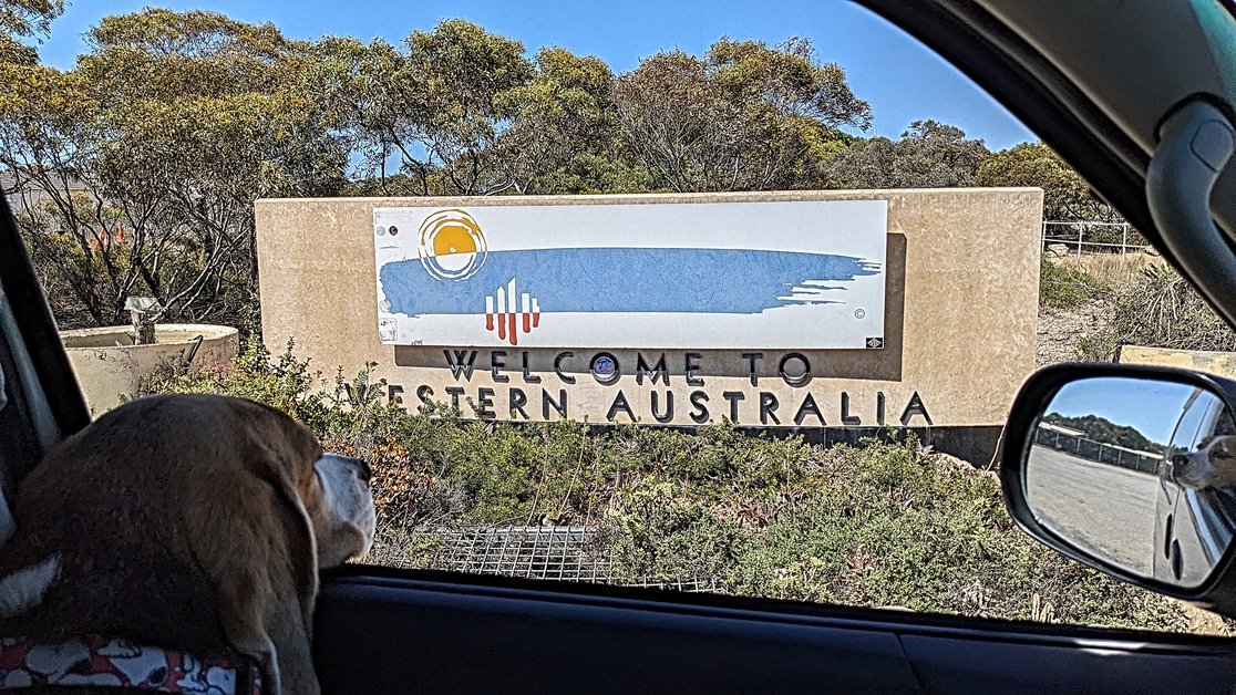 Image of the 'Welcome to Western Australia' sign at the Western Australia-South Australia border during an OzRoadTrip